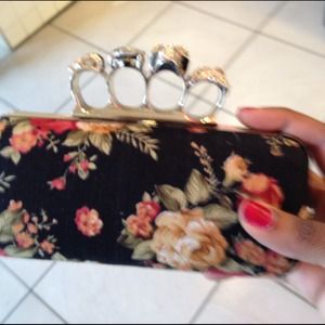 A floral knuckle clutch