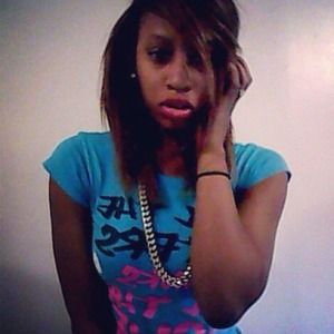 A short sleeve blue shirt.