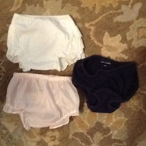 Three girls bloomers sizes are 3-9 months
