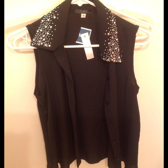 Sleeveless shear black top with studs on collar