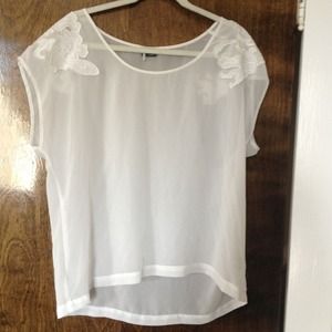 Sheer white sparkle and fade blouse.