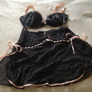 Bra and skirt. Very sexy black with pink trim