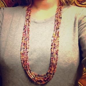 Handmade, brand-new beaded multistrand necklace.