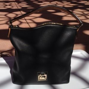 Authentic Dooney and Bourke black leather handbag.