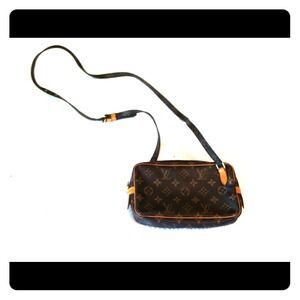 Louis Vuitton crossbody purse.