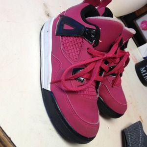 Girls Jordan's 4s pink and black