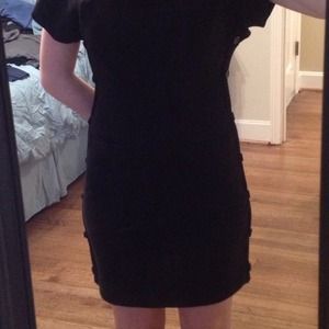 Black cotton dress with pockets in front
