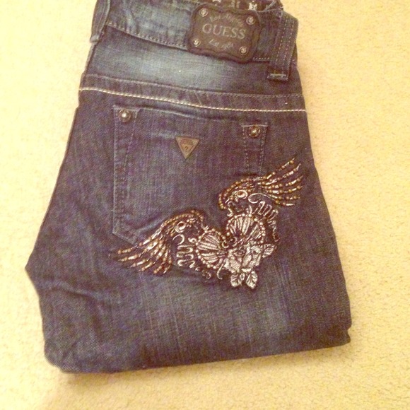 Guess dark wash jeans.