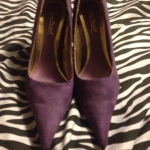 Plum pointy pumps