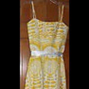 White and yellow formal gown by Alyn  Paige