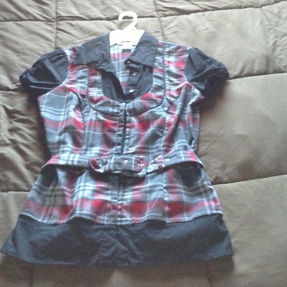 Plaid and black dress shirt with belt.
