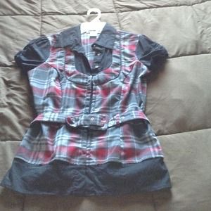 Plaid and black dress shirt with belt.