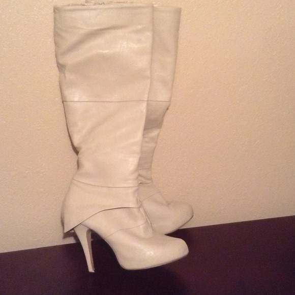 Cream knee high boots