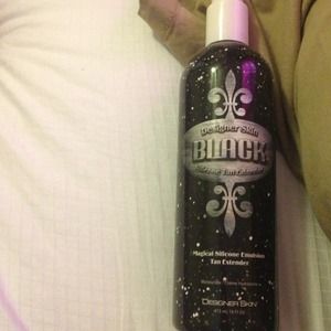 Designer skin tanning lotion