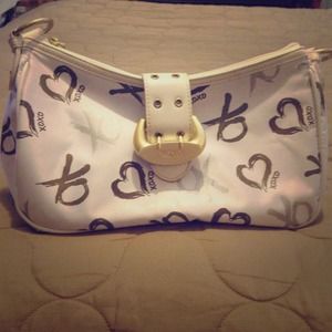 XOXO white purse.