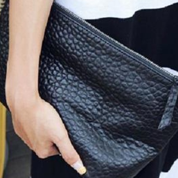 Black faux leather clutch