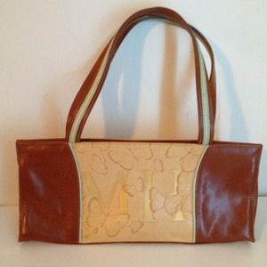 mario hernandez leather handbag