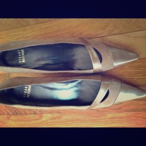 Stuart Weitzman suede and leather pumps.