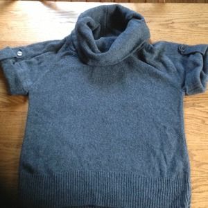 Over sized turtle neck sweater.