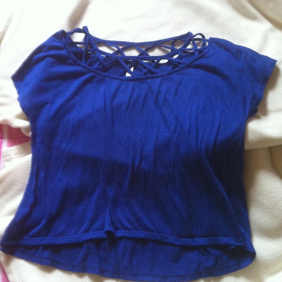 Short sleeve blue top with cutout neck detail