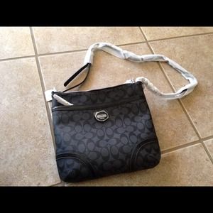 Authentic Coach black and grey handbag.NWT