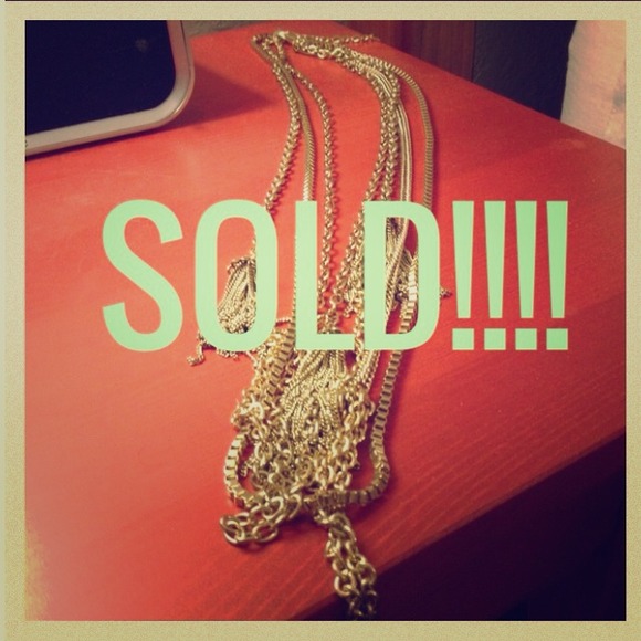 Gold necklace with tassels