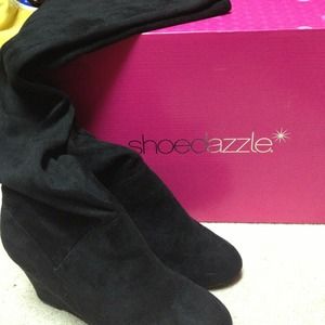 Black Suede thigh high wedge boots. Worn once.