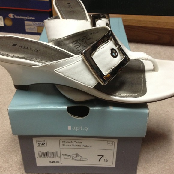 Shore White Patent Sandals with Silver buckle.