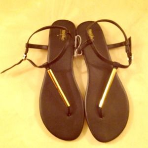 Black and gold sandals
