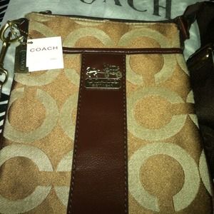 Coach slings with tags