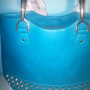 Teal handbag with shoulder strap included