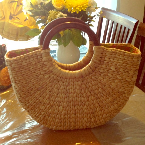 Rattan vacation bucket bag by Jennifer Maclear