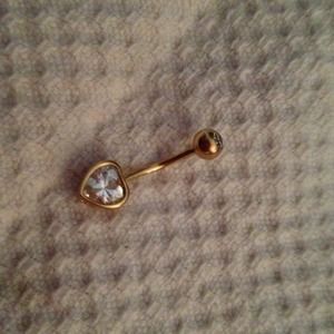 14 kt gold heart belly ring.