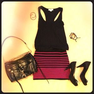 Black with hot pink strips tight mini skirt. Small