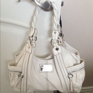 NWOT: Cute Relic bag with cheetah print inside!