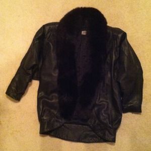Woman's black leather jacket with real black fur