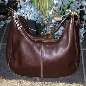 Medium size leather brown Authentic Coach bag