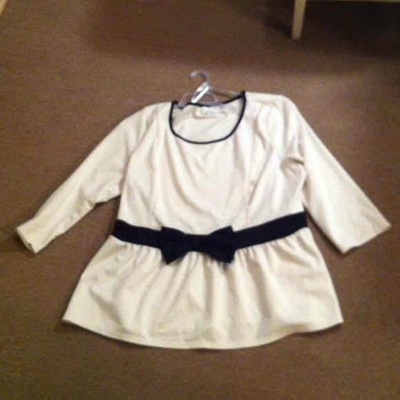 White peplum top with bow