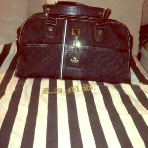 LAMB handbag with dust bag.