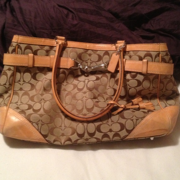 Tan coach tote with signature pattern