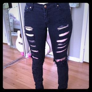 RESERVED Distressed black skinny jeans