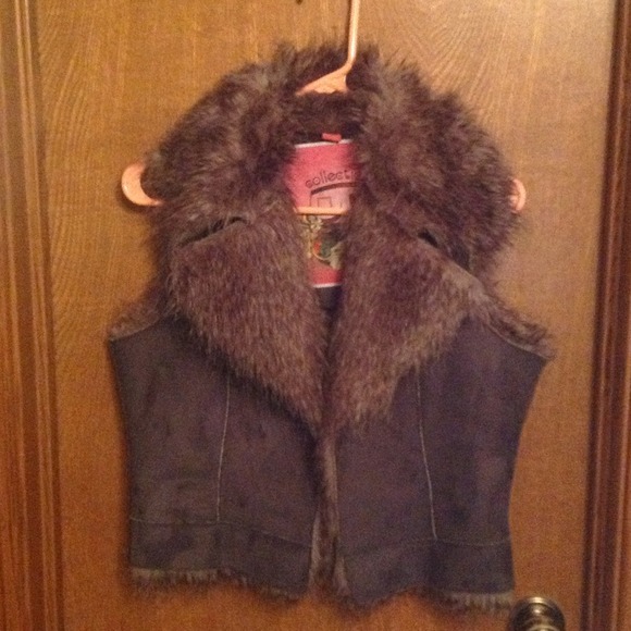 Brown leather fur lined vest
