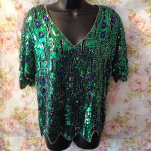 Sequined green top