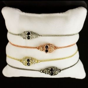 Gold Tone Skull Chain Bracelet with Rhinestones