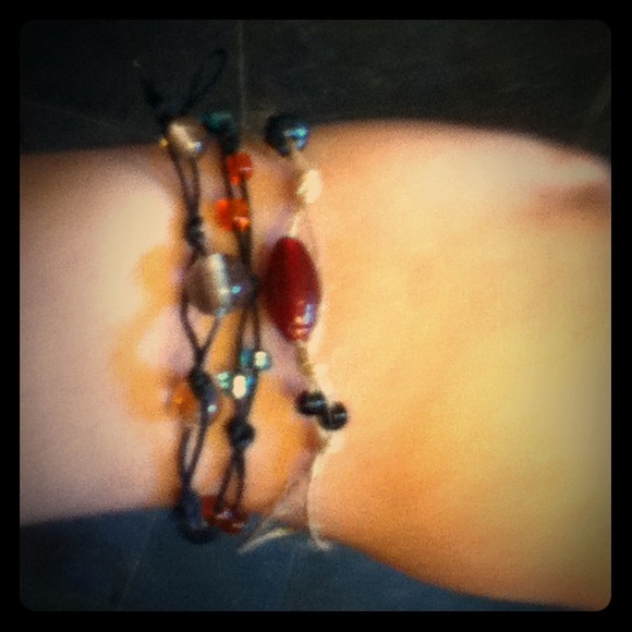 Three beaded bracelets.