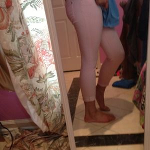Baby pink skinny jeans