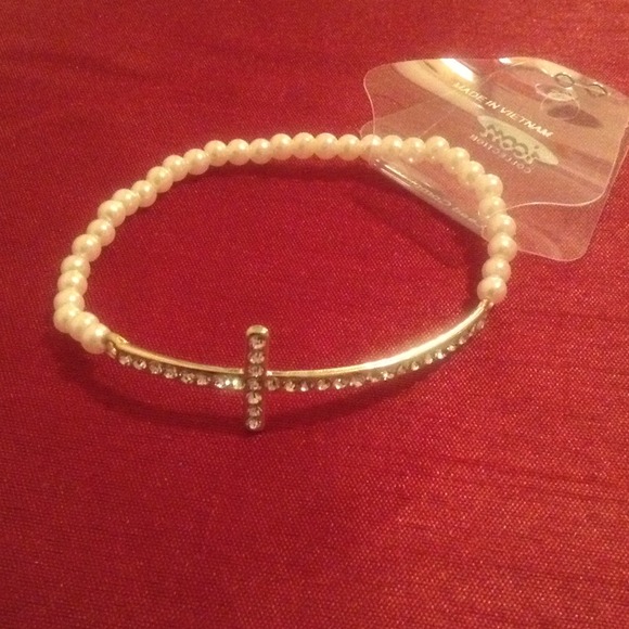 White/pearl Sideways Rhinestone Cross Bracelet.