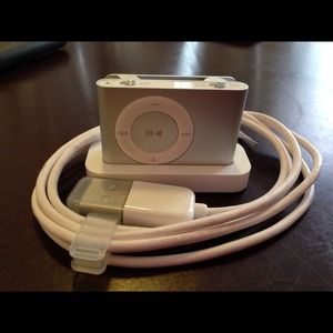 iPod shuffle.  Never used.  No headphones