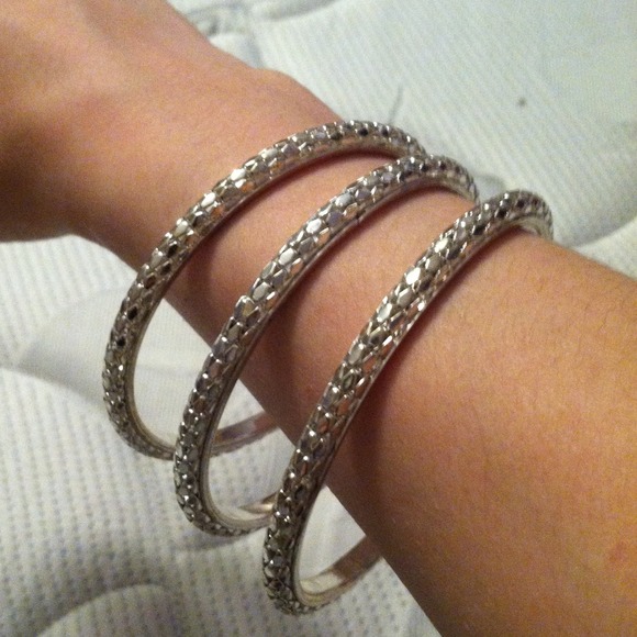 3 silver bracelets