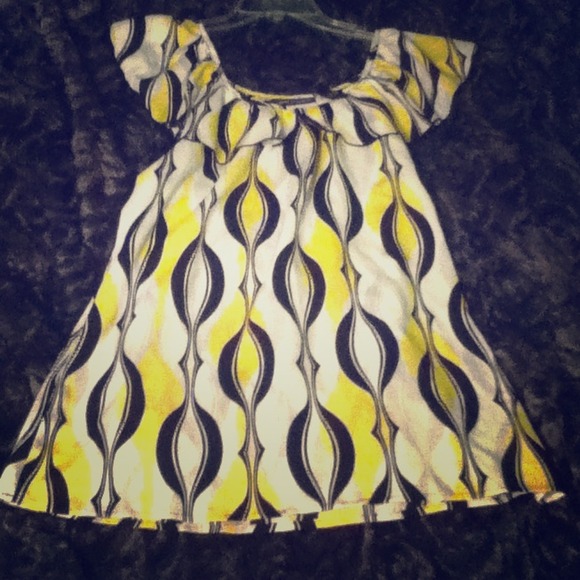 Jennifer Lauren long yellow and black shirt